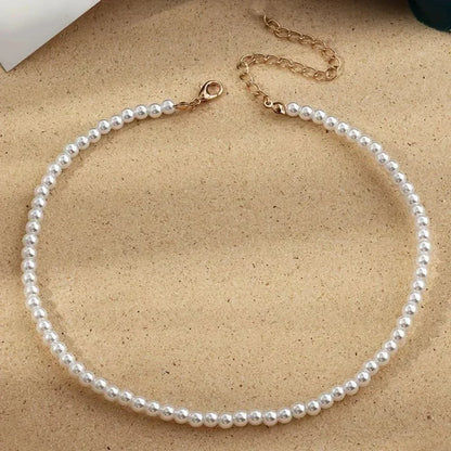 Nouveau collier chaîne simple en perles d'eau douce d'imitation