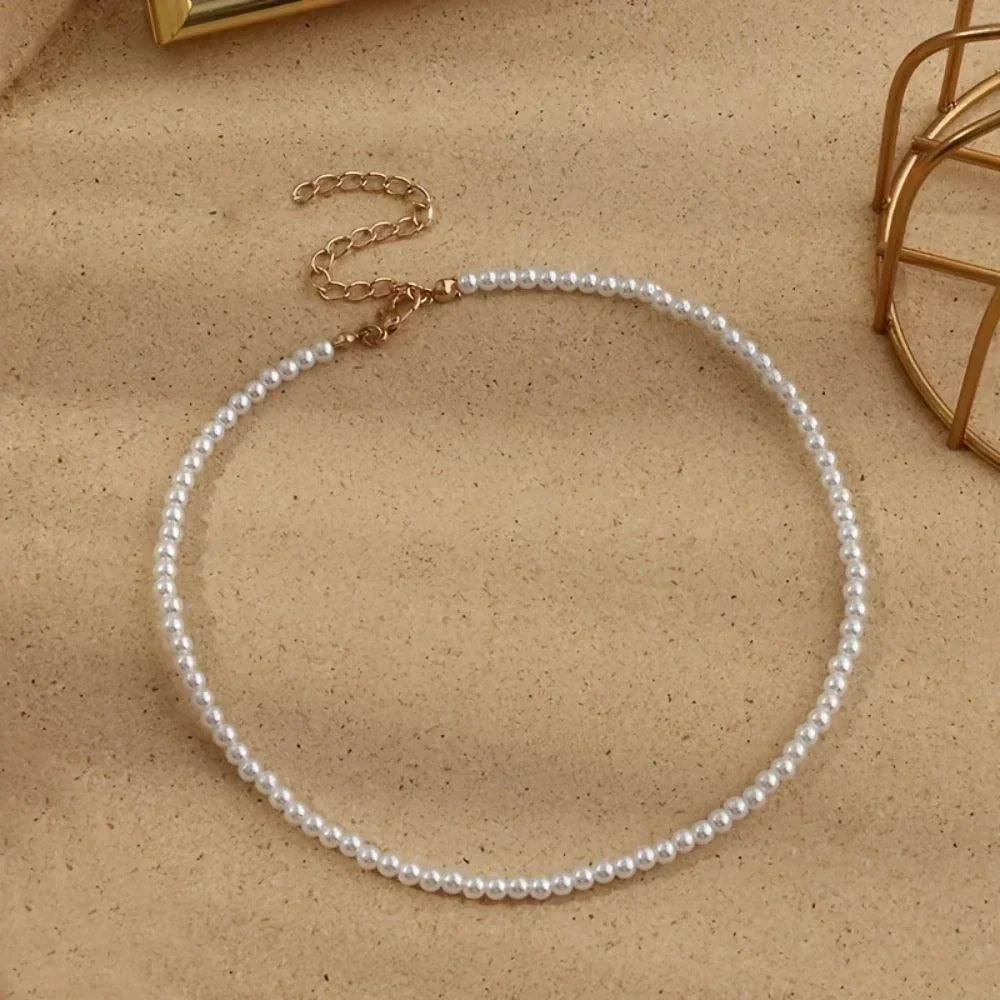 Nouveau collier chaîne simple en perles d'eau douce d'imitation